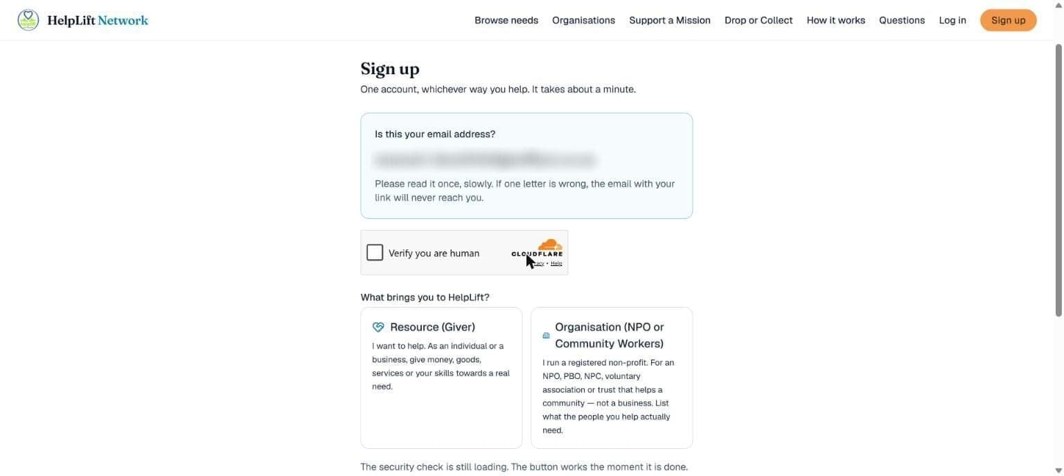 The sign-up screen: your email shown back to you, the security check, and the two cards to choose from